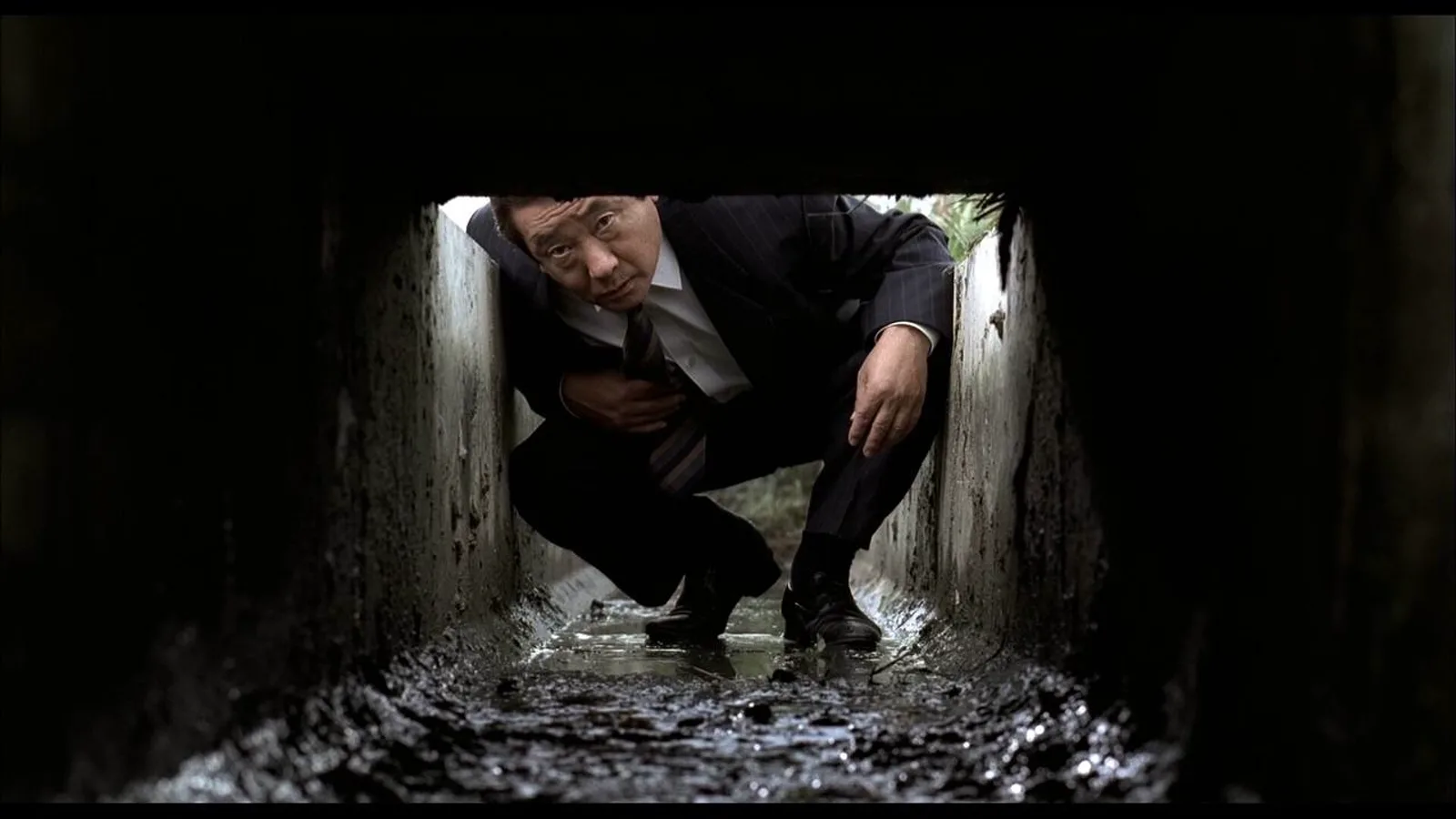 Кадр из материала к обзору «Воспоминания об убийстве»